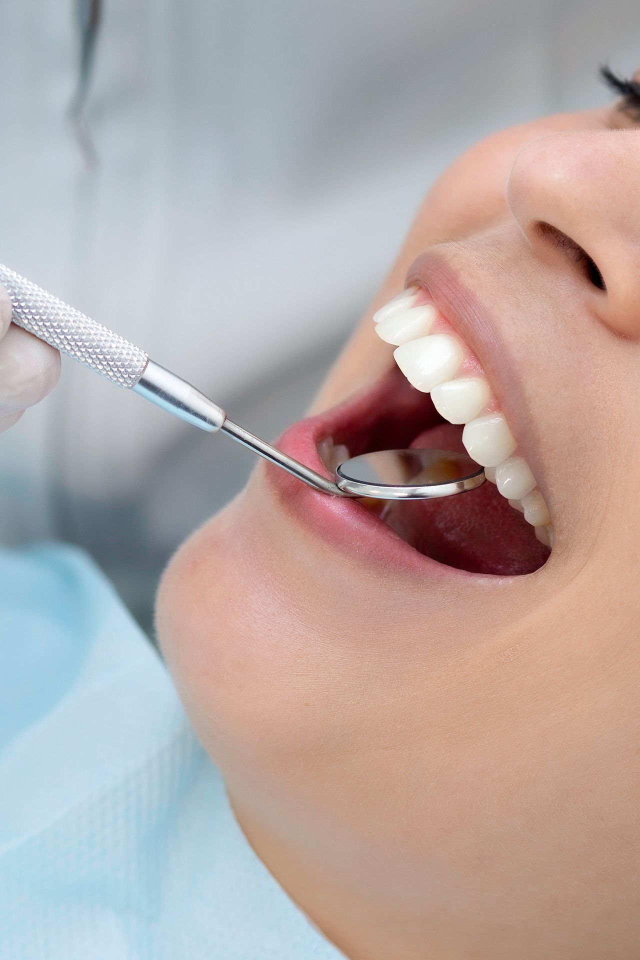 Patient smiling during a dental check-up